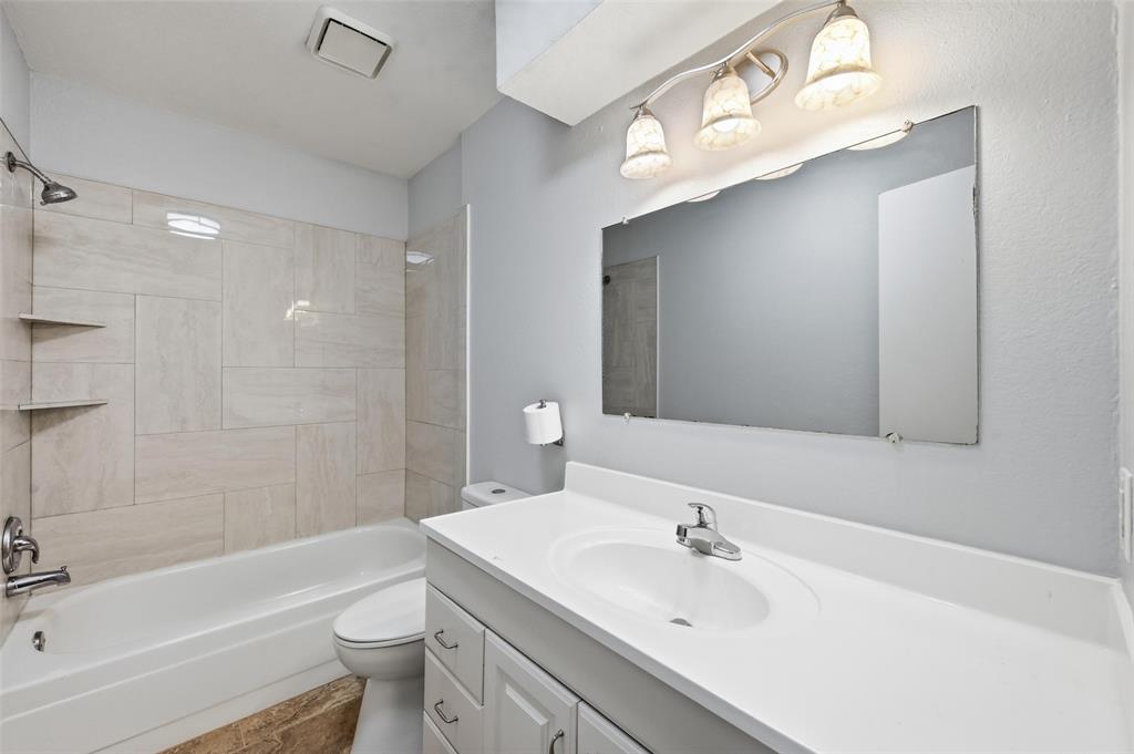 116 Main Place Euless, TX 76040 - Photo 18 of 31 a bathroom with a sink a toilet and shower