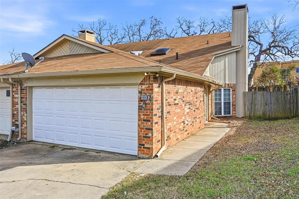 116 Main Place Euless, TX 76040 - Photo 25 of 31 a front view of a house with a garage