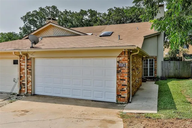 a view of a house with a garage