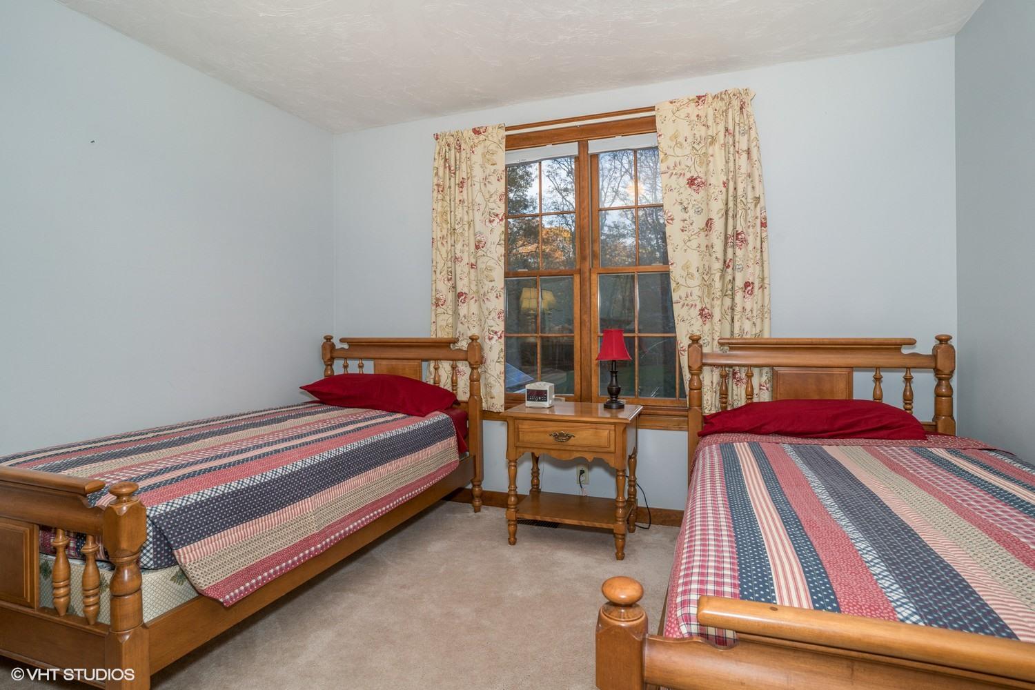 72 John Ewer Road Sandwich, MA 02563 - Photo 14 of 20 a bedroom with a bed and a window