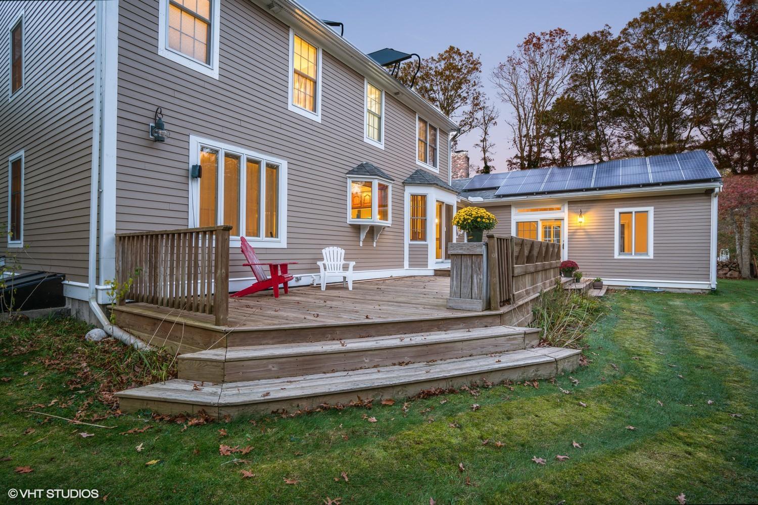 72 John Ewer Road Sandwich, MA 02563 - Photo 18 of 20 a front view of a house with a yard