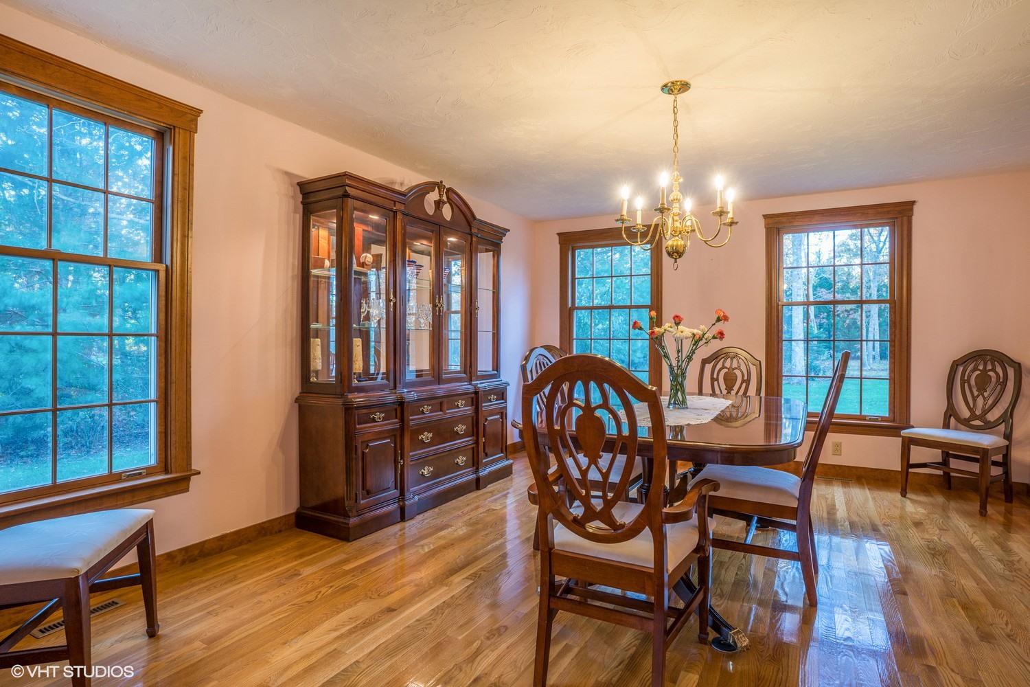 72 John Ewer Road Sandwich, MA 02563 - Photo 4 of 20 a view of a dining room with furniture window and wooden floor