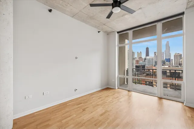 a room with gym equipment and a large window