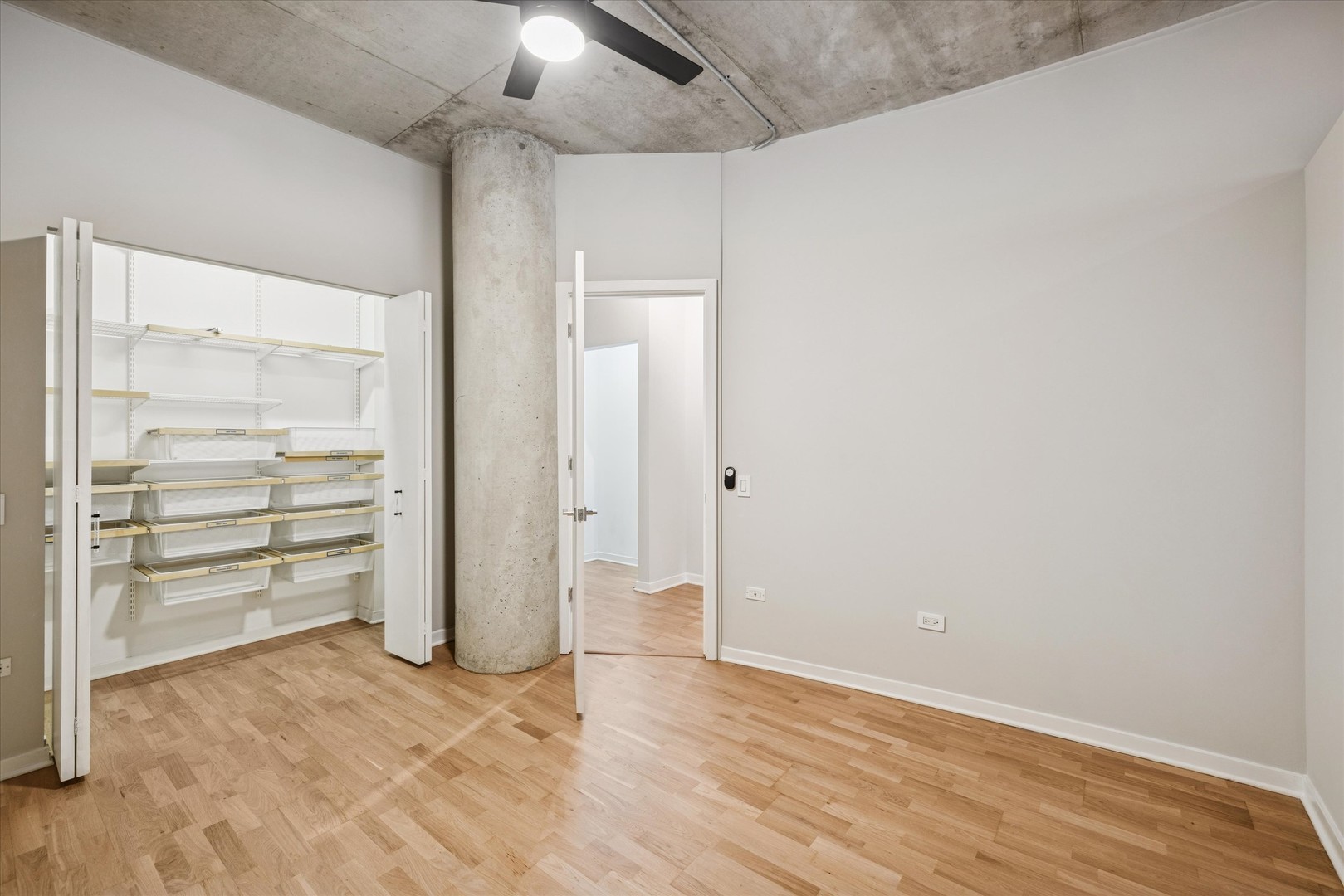 720 North Larrabee Street, Unit 1002 Chicago, IL 60654 - Photo 9 of 20 an empty room with an empty space