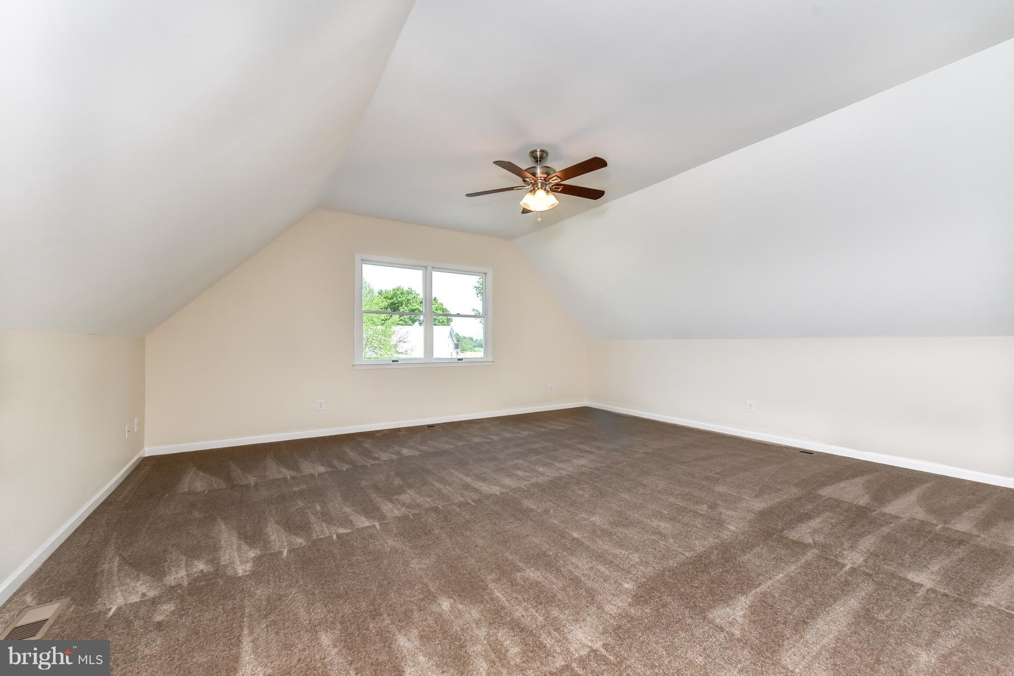 1101 Lombard Road Rising Sun, MD 21911 - Photo 17 of 26 an empty room with a window and a fan
