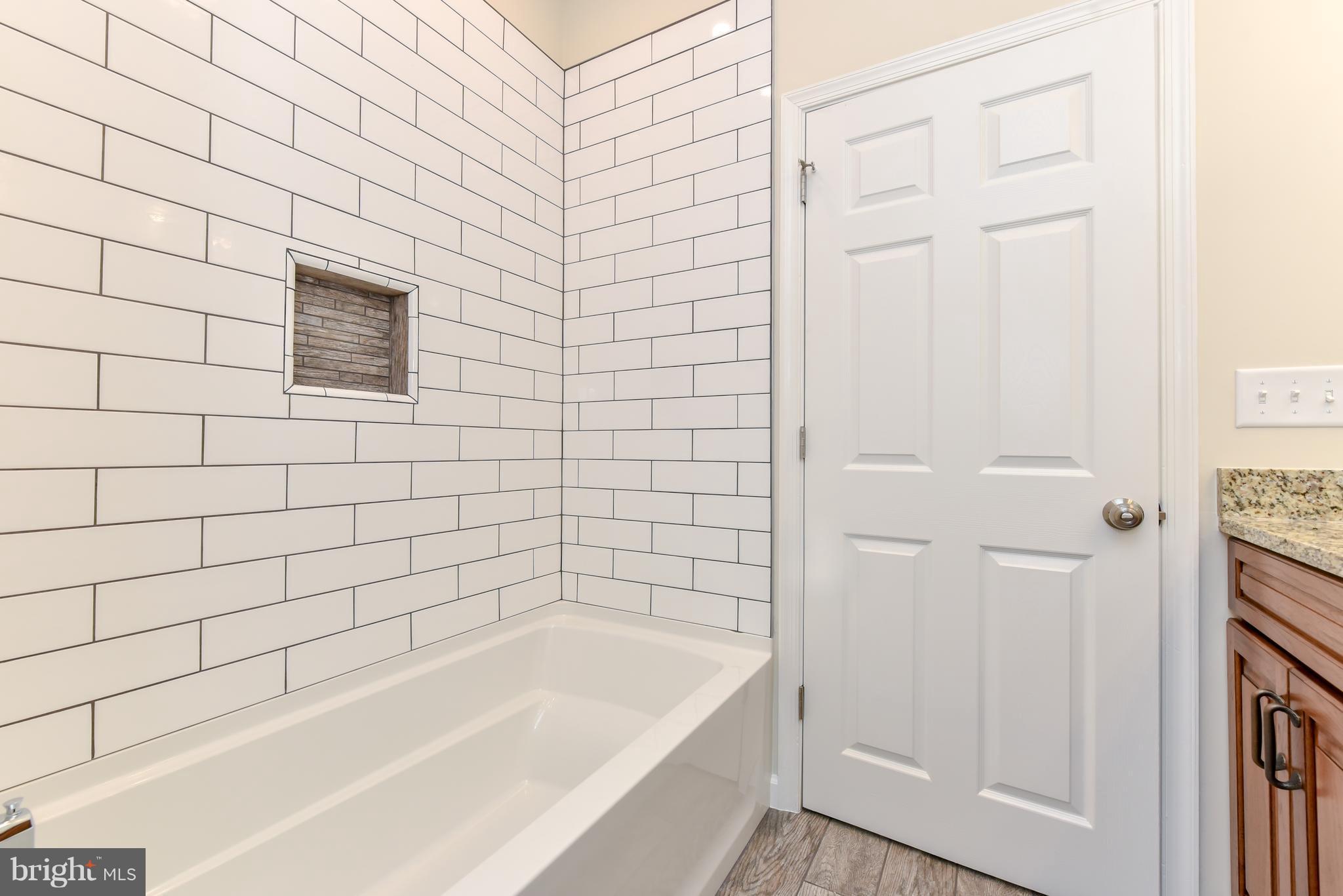 1101 Lombard Road Rising Sun, MD 21911 - Photo 20 of 26 a bathroom with a bathtub