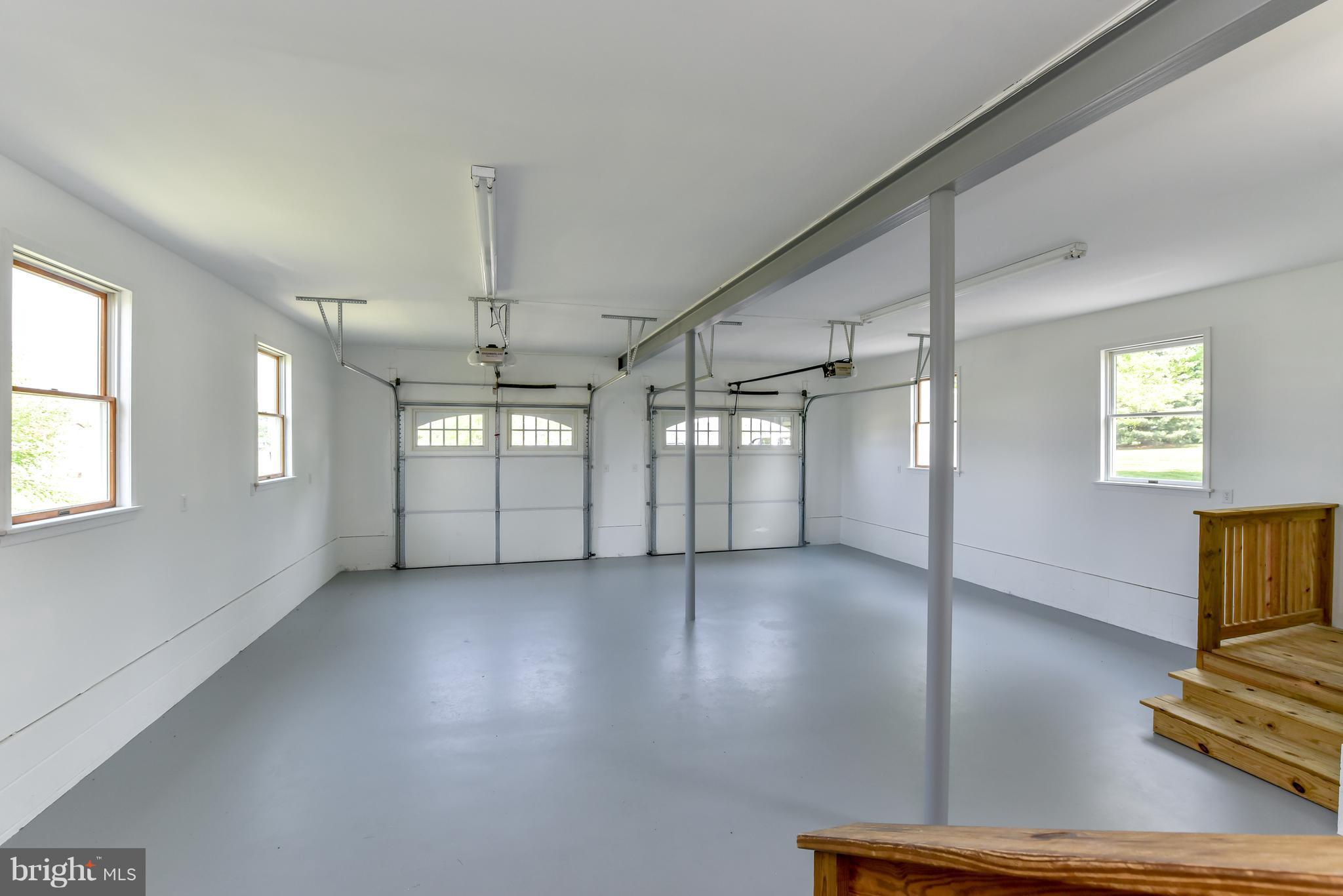 1101 Lombard Road Rising Sun, MD 21911 - Photo 23 of 26 an empty room with windows and ceiling fan