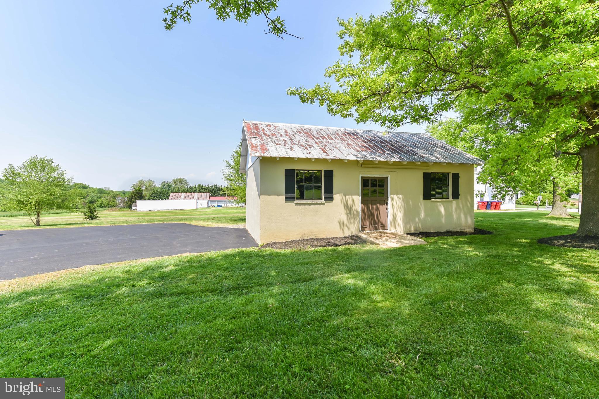 1101 Lombard Road Rising Sun, MD 21911 - Photo 24 of 26 a view of a house with backyard and sitting area
