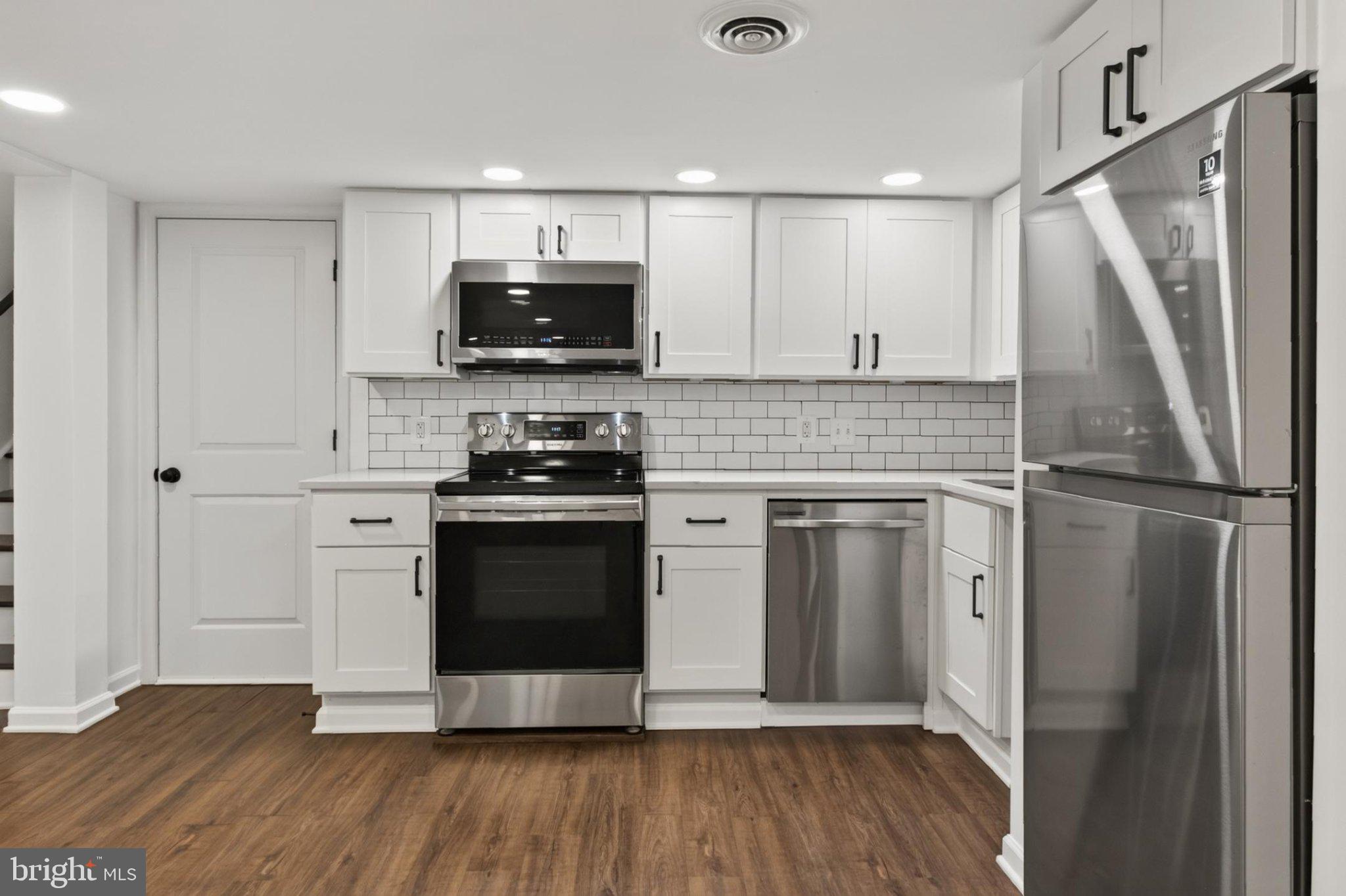 738 11th Street Northeast, Unit 3 Washington, DC 20002 - Photo 13 of 29 Modern kitchen with sleek finishes.