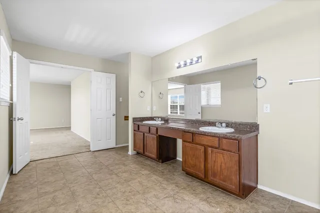 a view of a balcony with wooden floor
