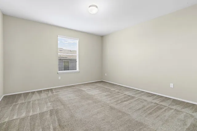 an empty room with an entryway