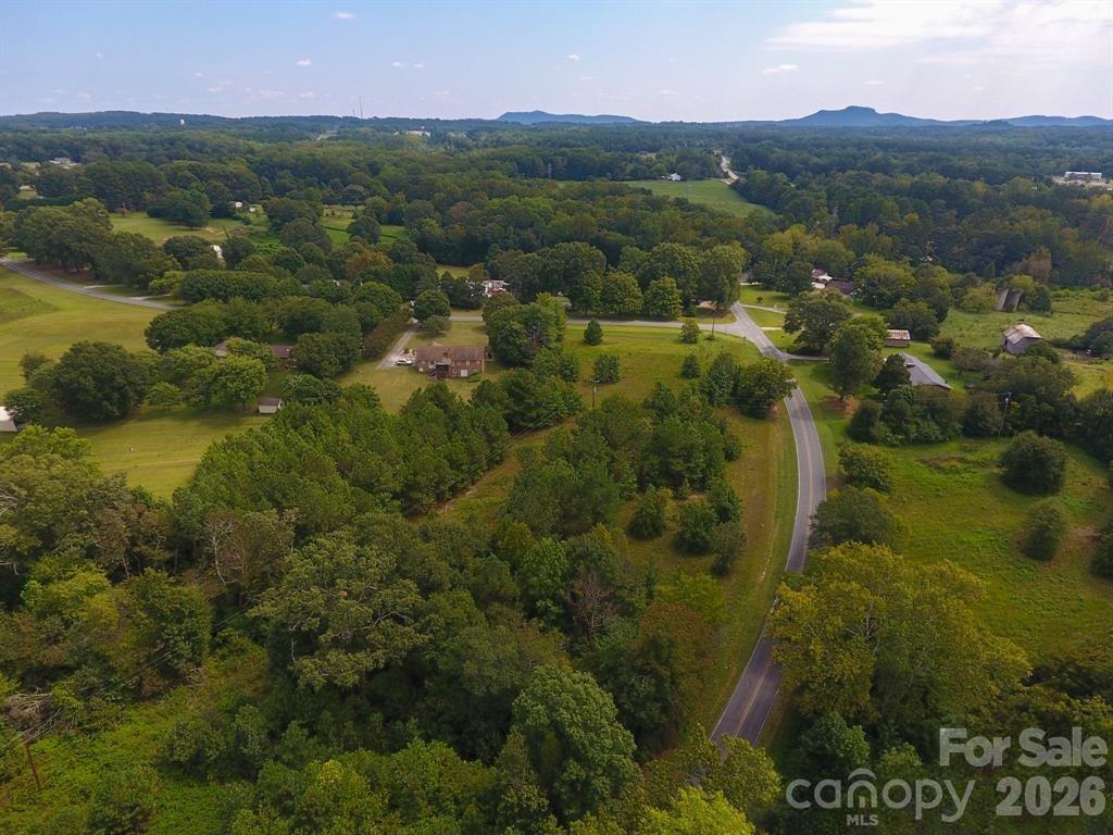 0 Putnam Lake Road Kings Mountain, NC 28086 - Photo 3 of 7 an aerial view of residential houses with outdoor space and trees