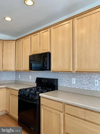 a kitchen with a large stove top oven