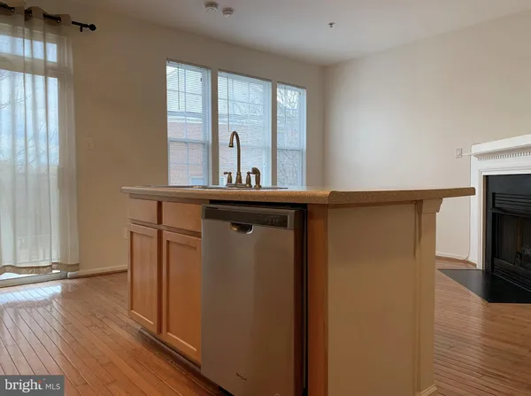 a view of living room with furniture and flat screen tv