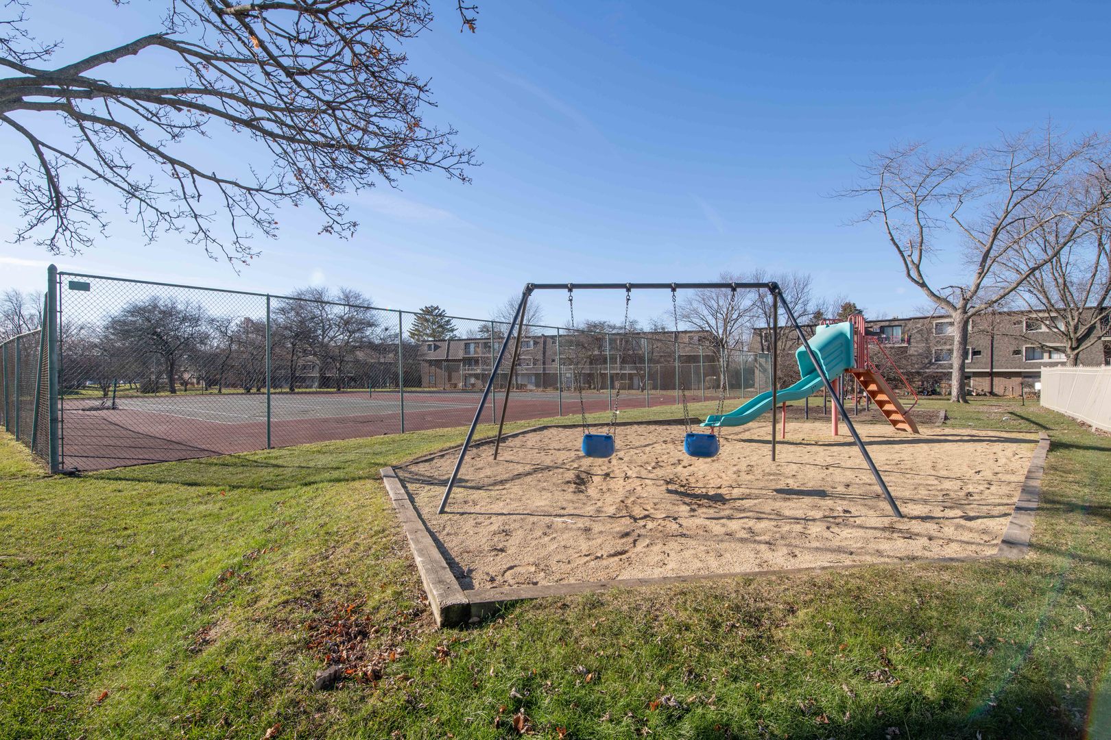 118 East Bailey Road, Unit A Naperville, IL 60565 - Photo 14 of 15 a view of a park with swings