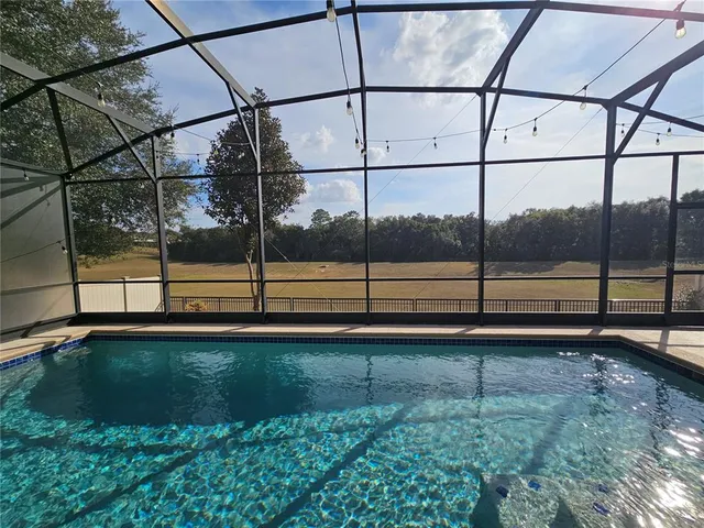 a view of swimming pool with outdoor space