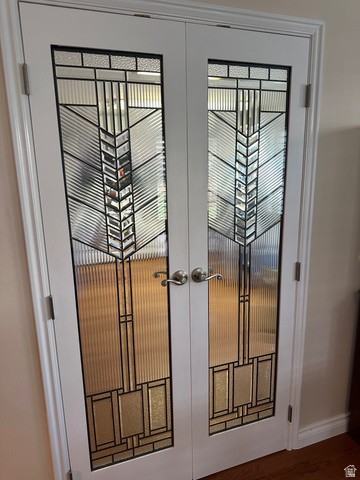 254 Meadow Lane Centerville, UT 84014 - Photo 12 of 34 White French doors with decorative glass inserts featuring a geometric pattern