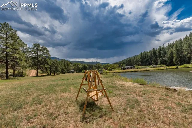 a view of a chair and tables in the balcony