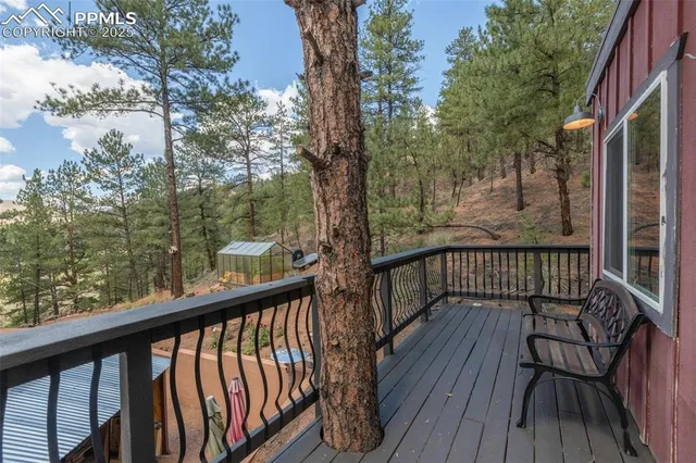 a view of balcony with furniture