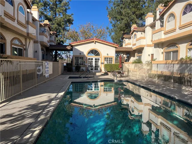 a view of a building with a swimming pool