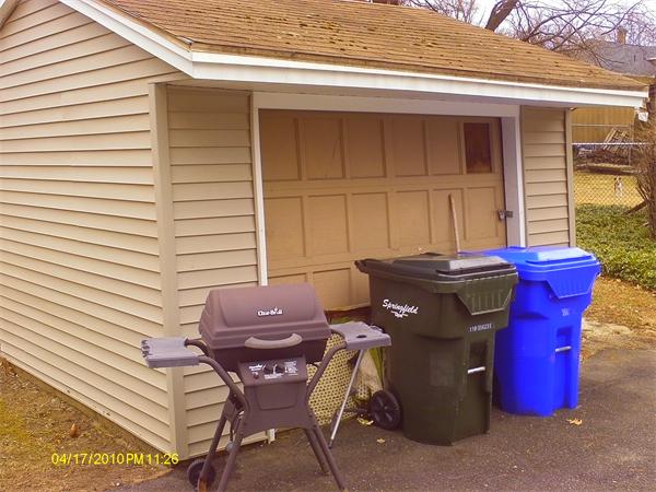 27 Calvin Street Springfield, MA 01104 - Photo 13 of 14 a view of a chairs and table in the back
