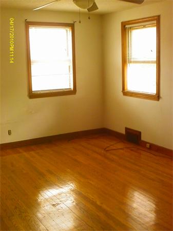 27 Calvin Street Springfield, MA 01104 - Photo 6 of 14 a view of a room that has a window in it