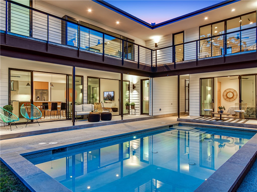 505 Post Rd Drive Austin, TX 78704 - Photo 1 of 1 a large building with swimming pool in front of it