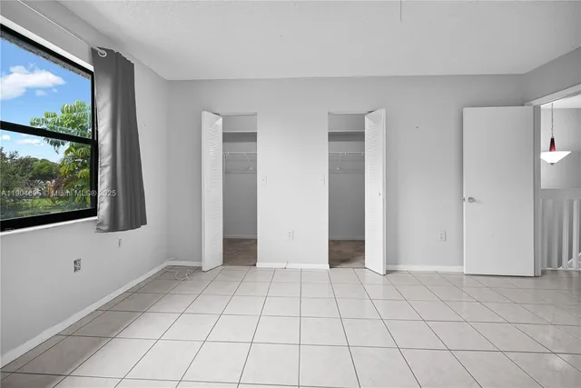 a view of an empty room with window