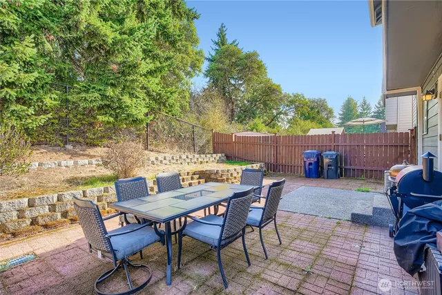 a view of a terrace with sitting area