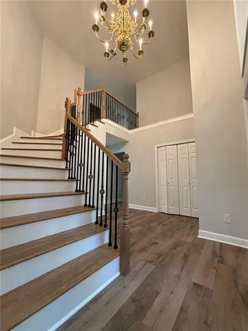 a kitchen with a refrigerator and a sink