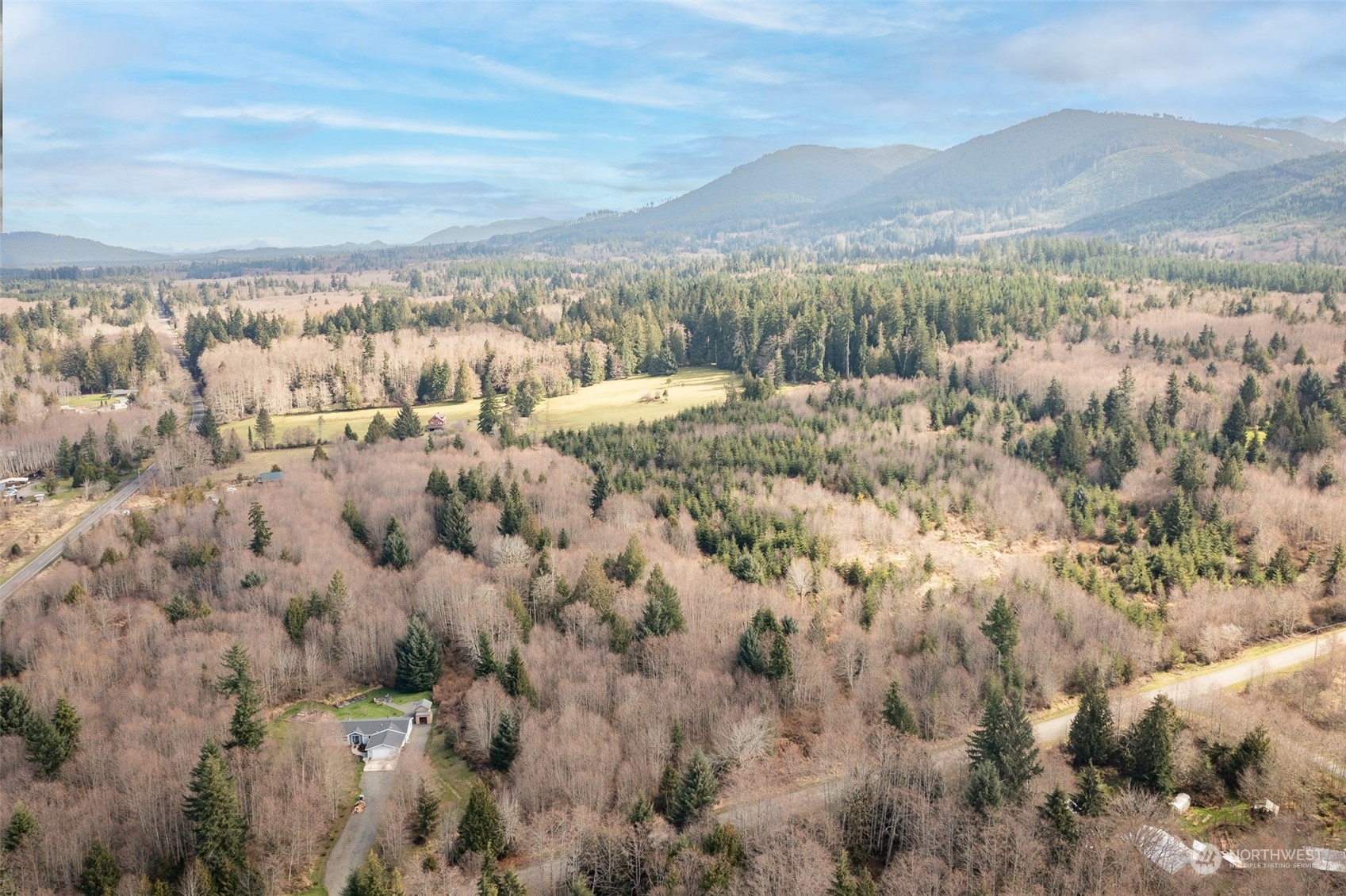 125 Howard Road Port Angeles, WA 98363 - Photo 6 of 18 a view of an outdoor space and mountain view