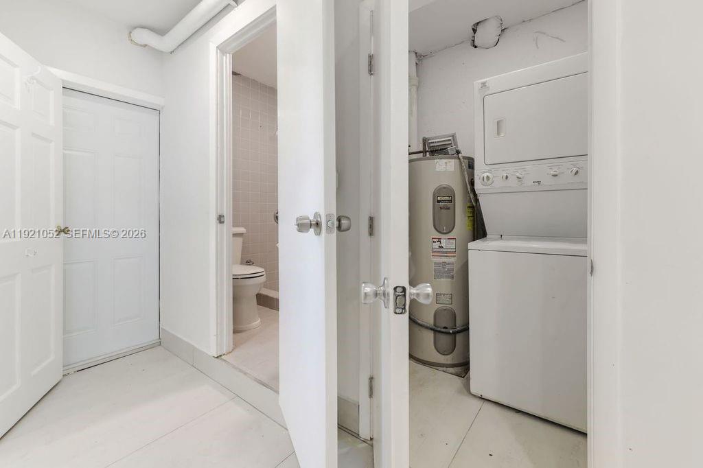 725 91st Street Surfside, FL 33154 - Photo 29 of 32 a bathroom with a sink and toilet