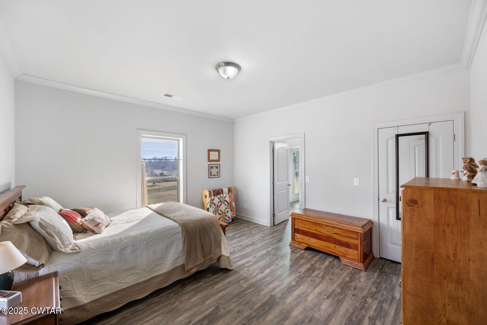 96 Highway 200 Luray, TN 38352 - Photo 16 of 44 a bedroom with bed and a window