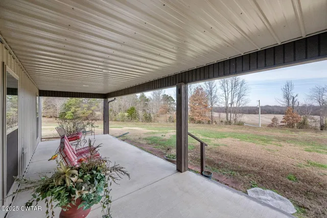 a view of a yard with an outdoor space
