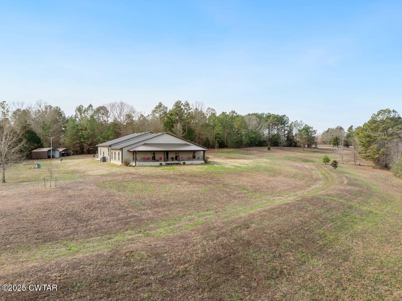96 Highway 200 Luray, TN 38352 - Photo 35 of 44 a view of a town with trees around