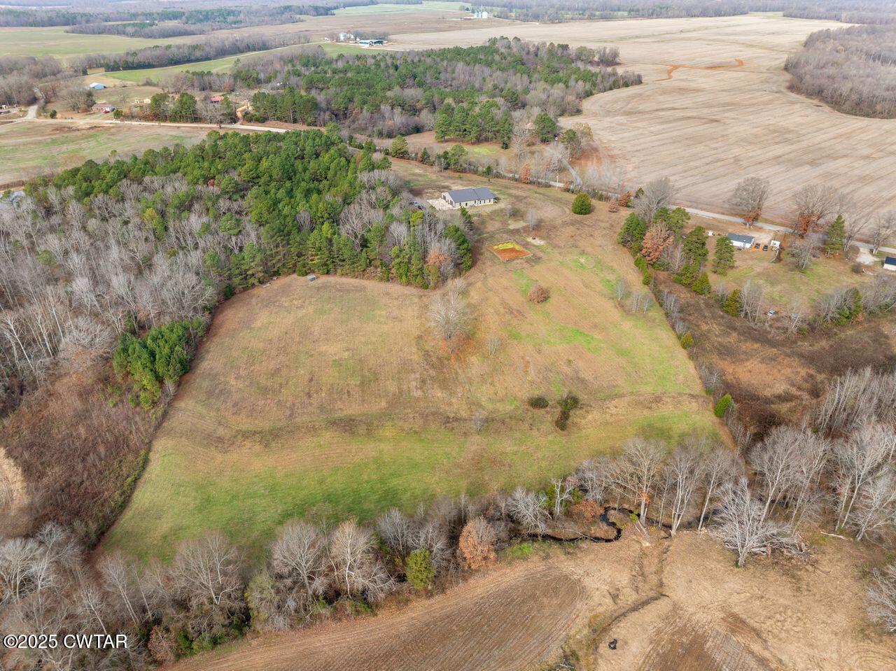 96 Highway 200 Luray, TN 38352 - Photo 42 of 44 a view of a yard with an outdoor space