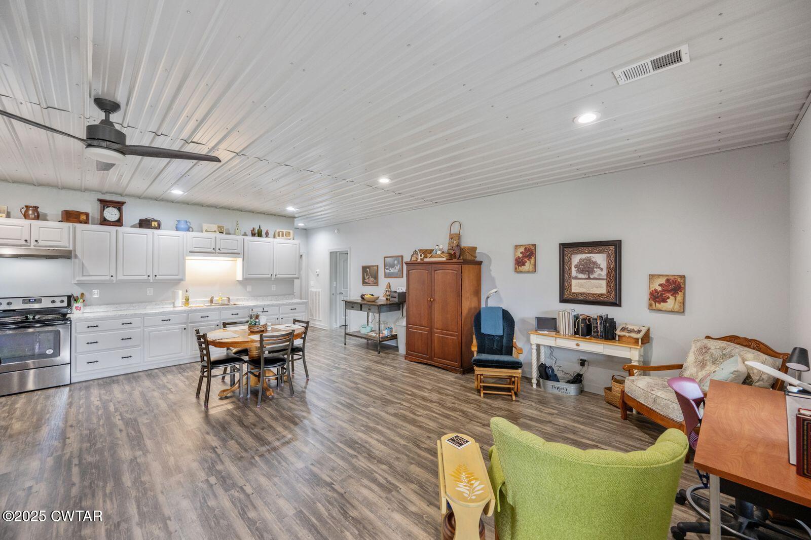 96 Highway 200 Luray, TN 38352 - Photo 8 of 44 a living room with furniture and a wooden floor