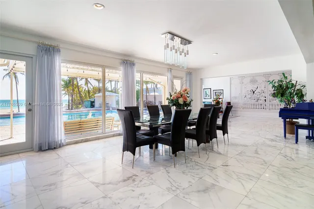 a view of a livingroom with furniture and a fireplace