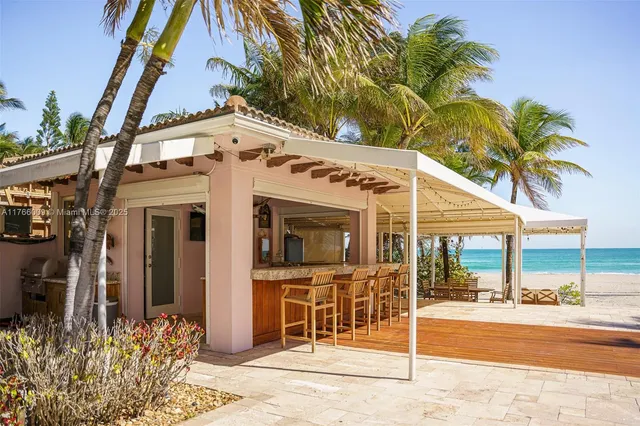 a view of a room with gym equipment and a large window