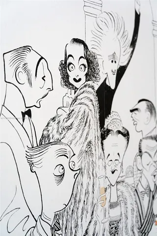 a living room with furniture potted plant and a window