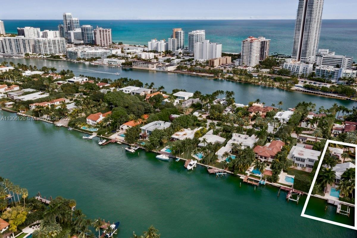 6300 Allison Road Miami Beach, FL 33141 - Photo 21 of 24 a view of a lake with boats and trees
