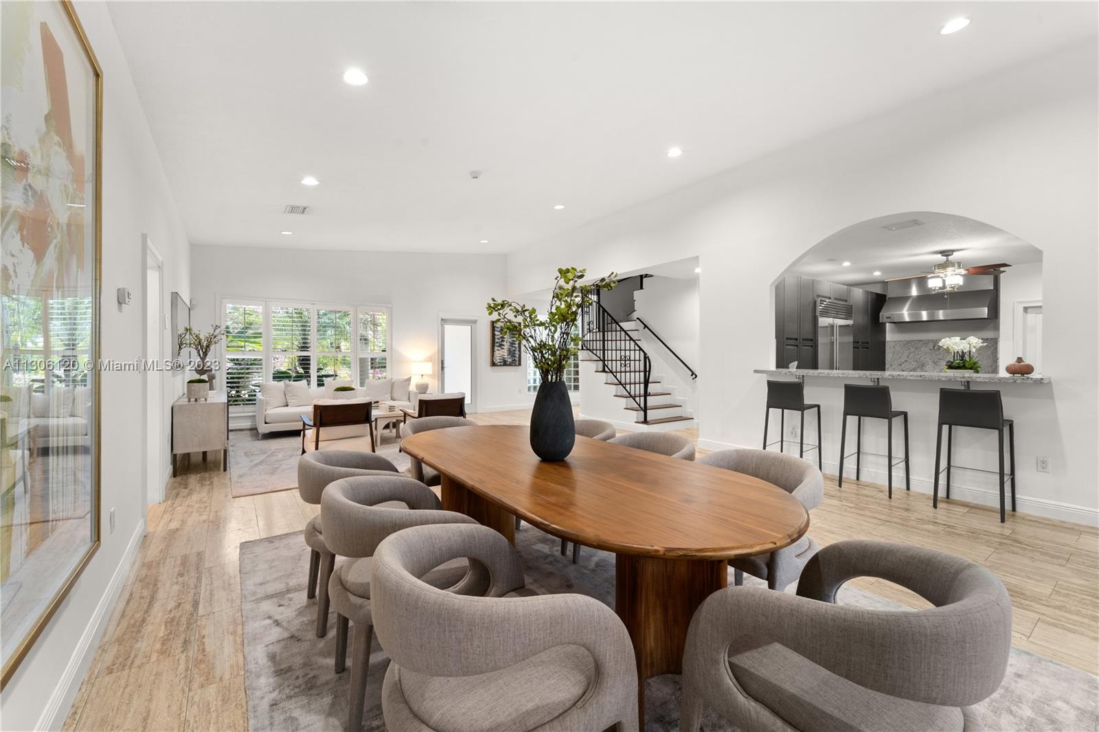 6300 Allison Road Miami Beach, FL 33141 - Photo 5 of 24 a living room with furniture and a table