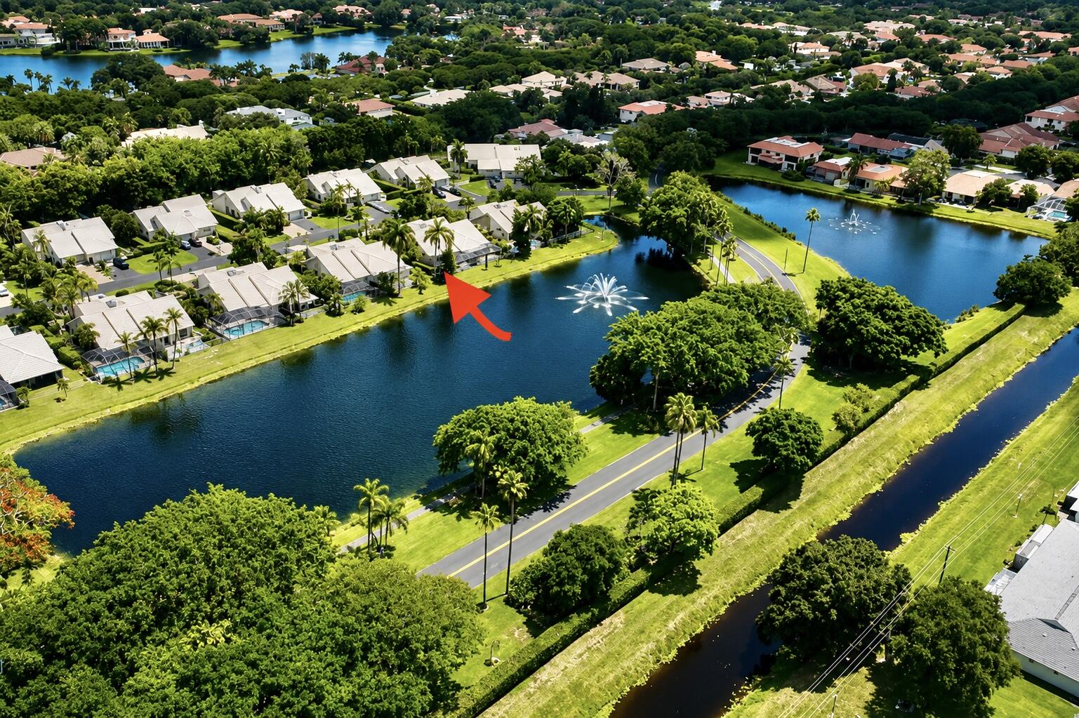 9708 Erica Court Boca Raton, FL 33496 - Photo 52 of 54 an aerial view of a houses with a lake view