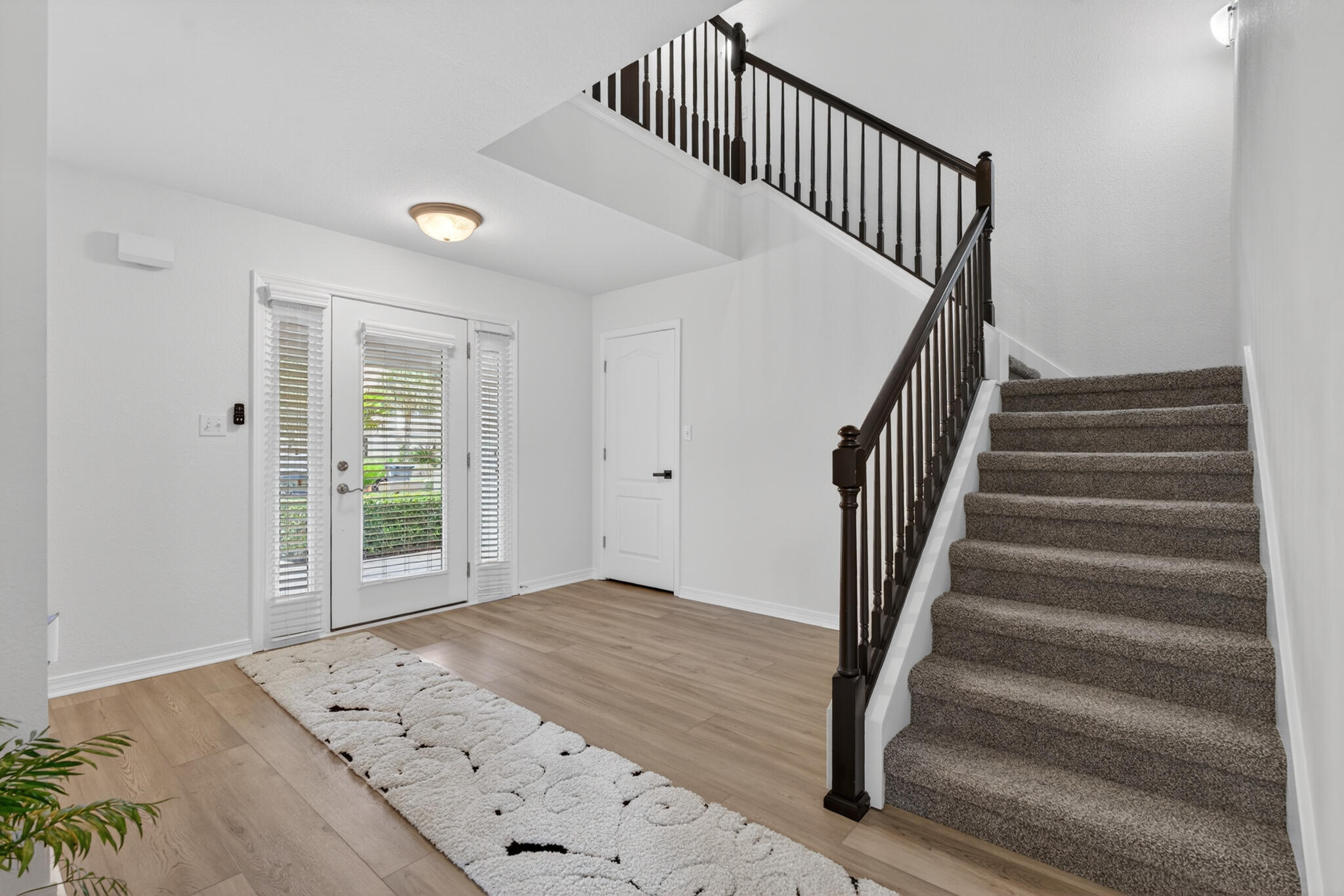 268 Loblolly Bay Drive Santa Rosa Beach, FL 32459 - Photo 3 of 73 a view of entryway with wooden floor