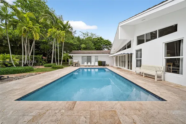a view of a house with a swimming pool