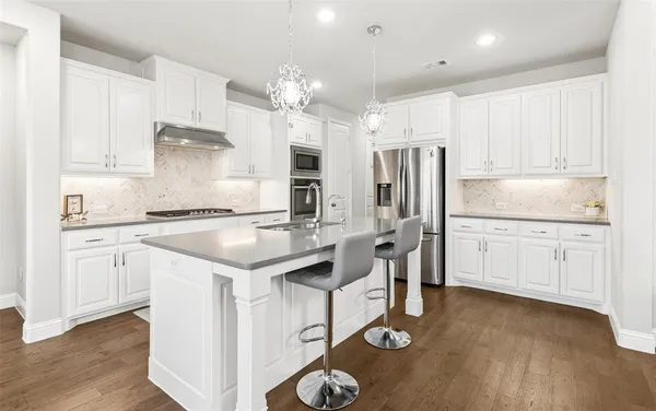 a view of a dining room with furniture