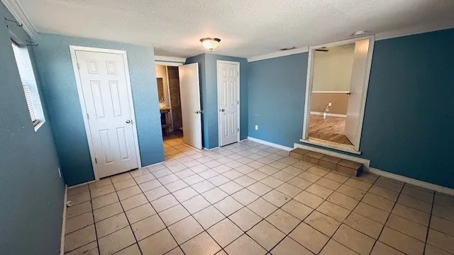 a bathroom with a sink mirror and a shower