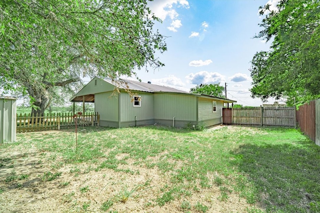 305 East Milam Street Pettus, TX 78416 - Photo 20 of 21 a house view with backyard space