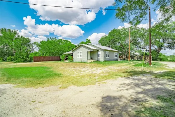 a house view with garden space