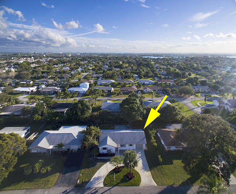 328 Leigh Road Tequesta, FL 33469 - Photo 1 of 21 01_aerial-front_328 Leigh Road